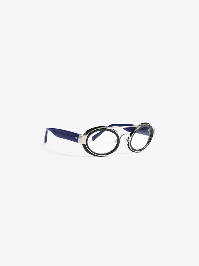 A round black-rimmed eyeglasses with a distinctive double bridge