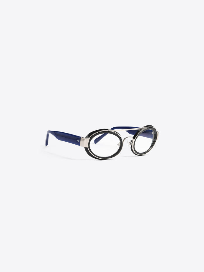 A round black-rimmed eyeglasses with a distinctive double bridge