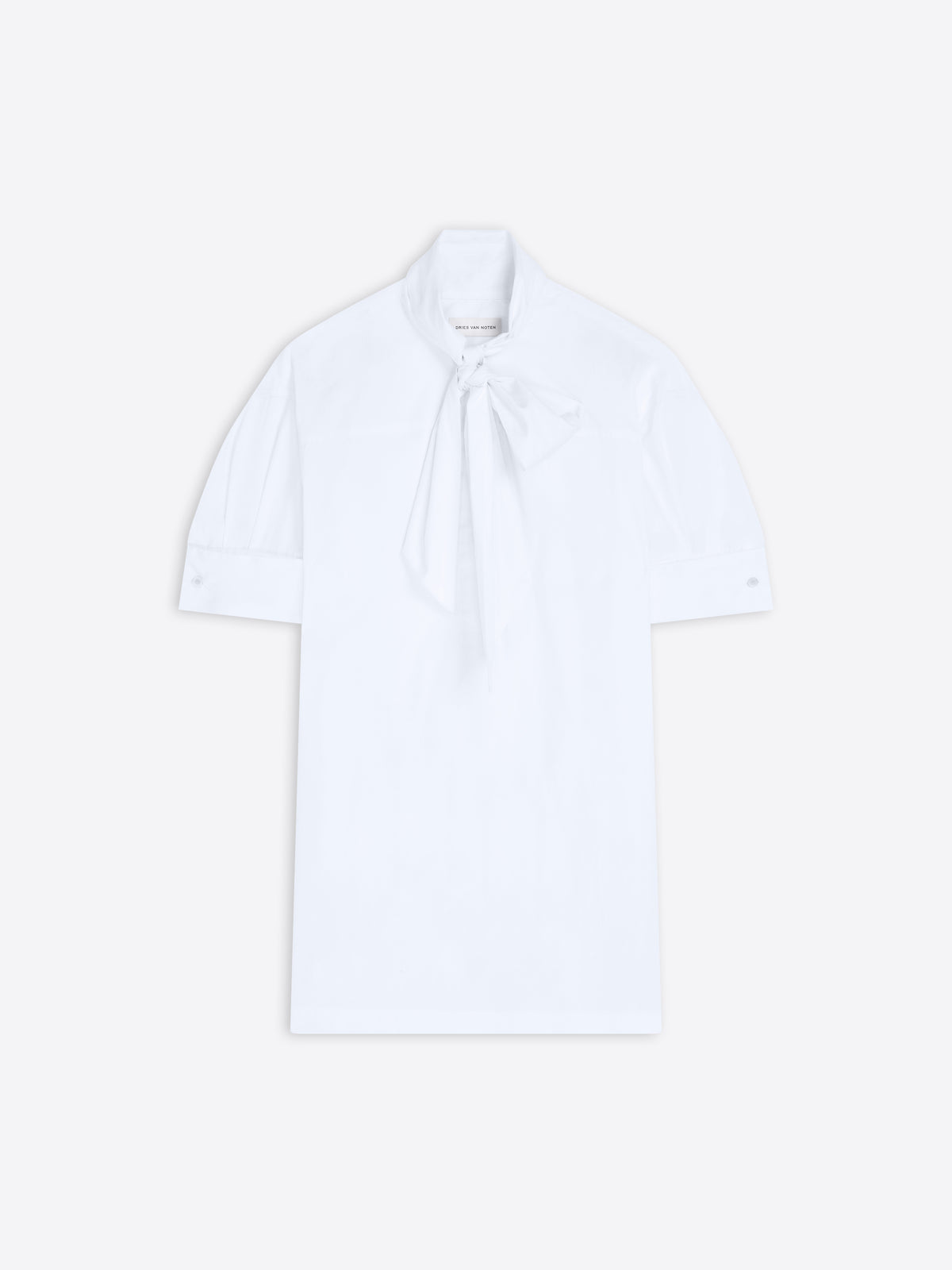 White blouse with a tie neckline on a light background