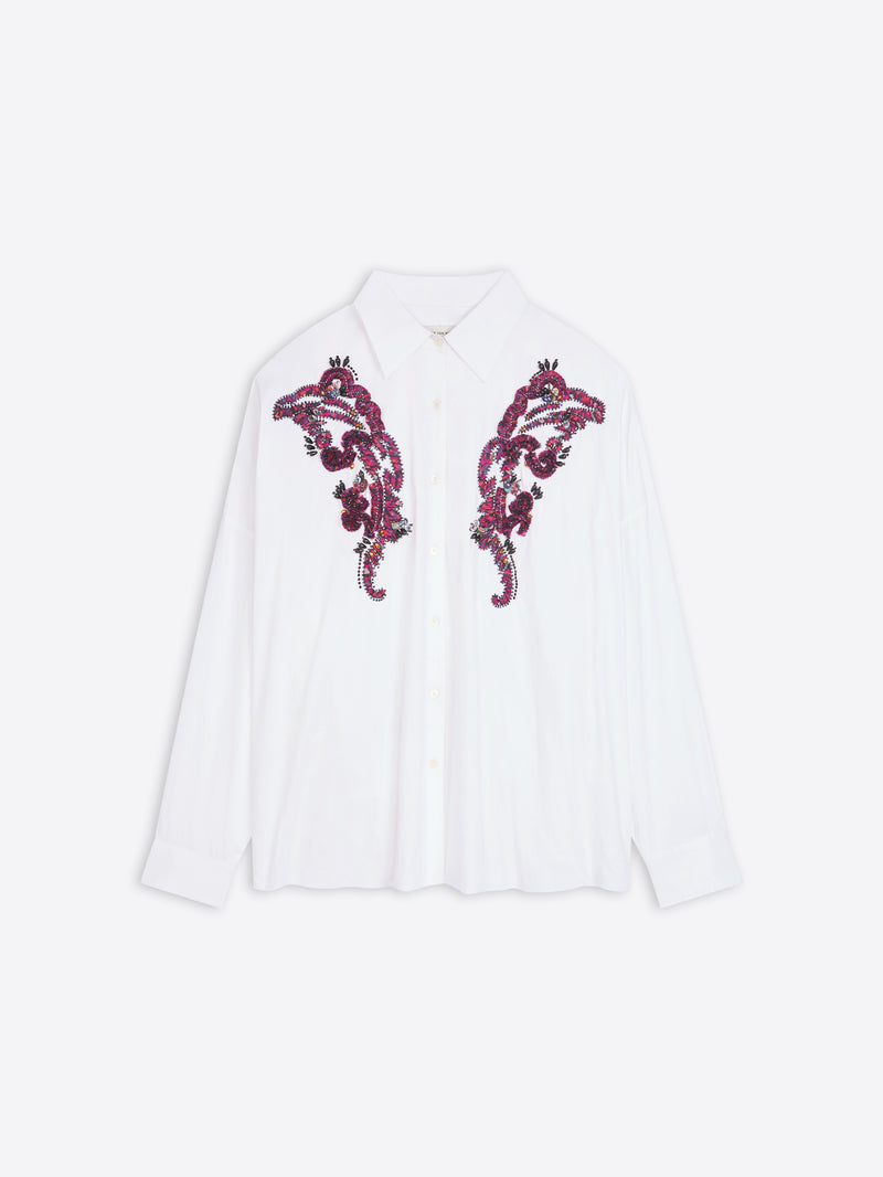 White shirt with purple floral embroidery on a white background