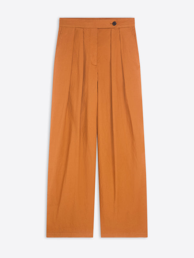 Wide-leg orange pants on a white background
