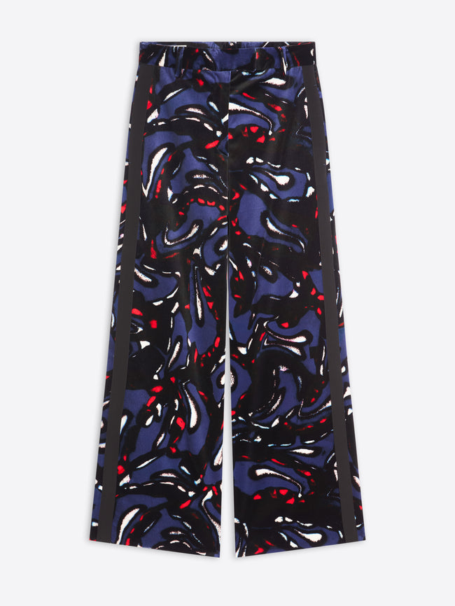 Colorful patterned pants with black stripes on a white background