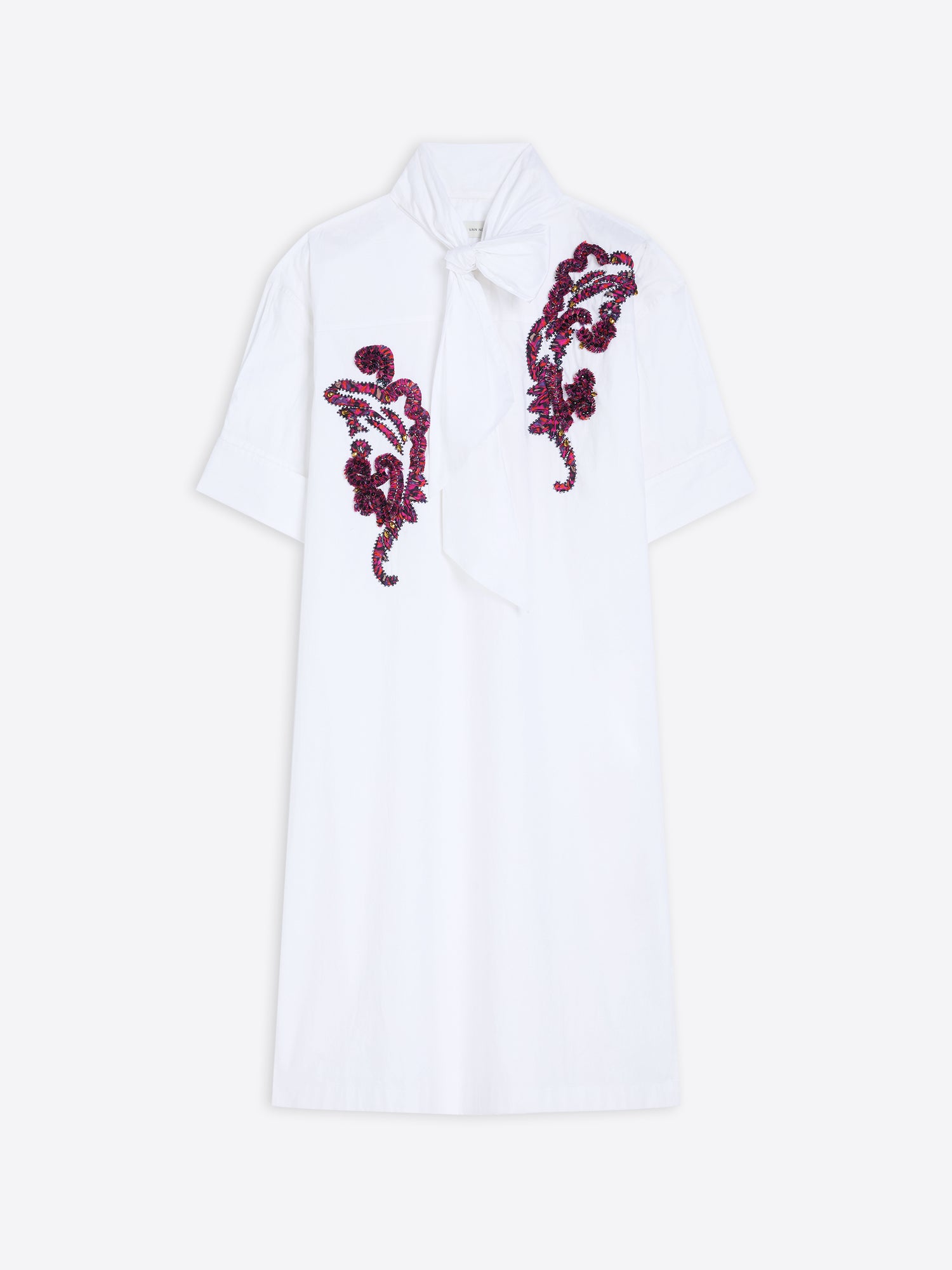 White shirt with purple floral embroidery on a white background