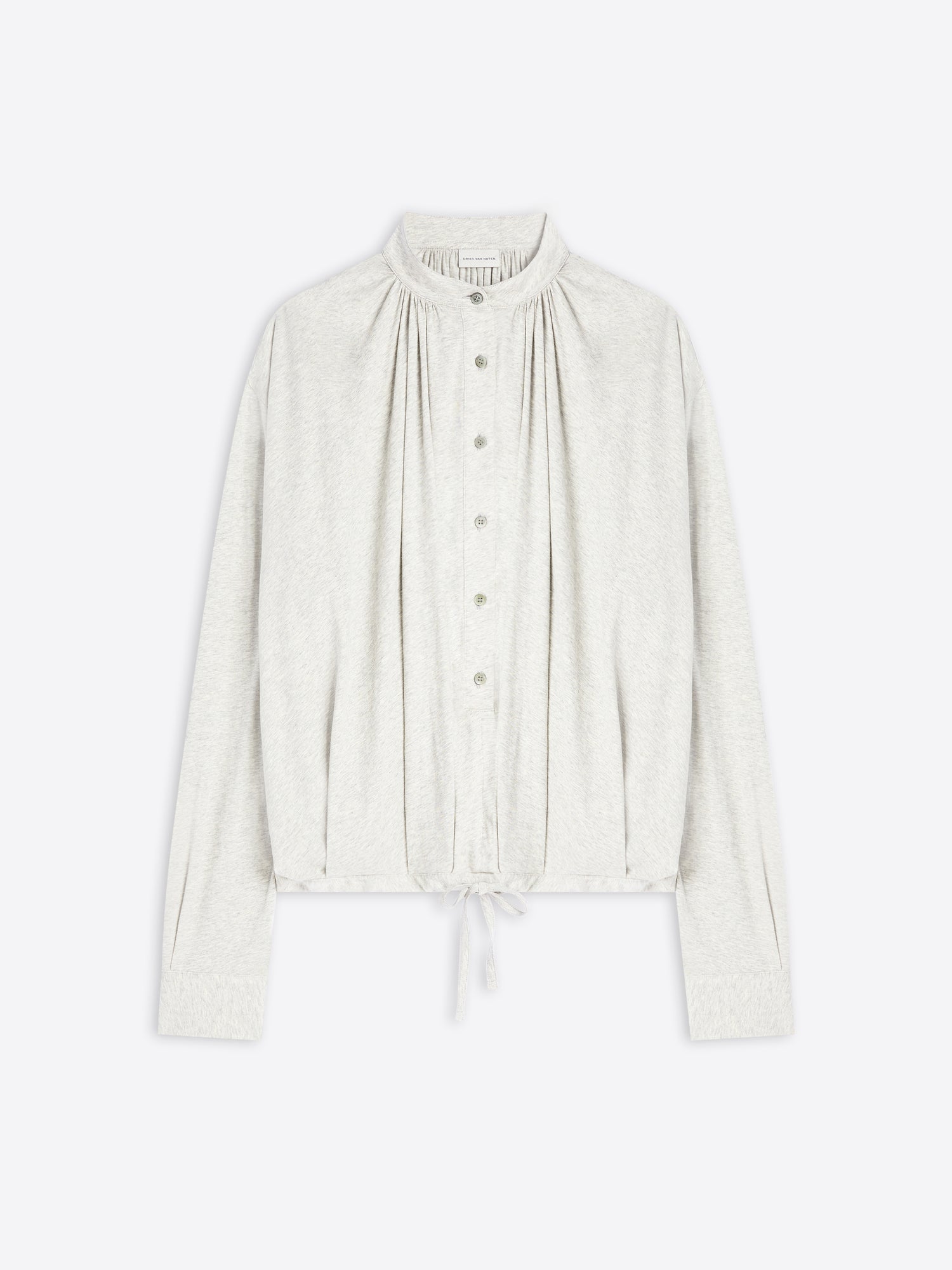 Light-toned blouse on a white background