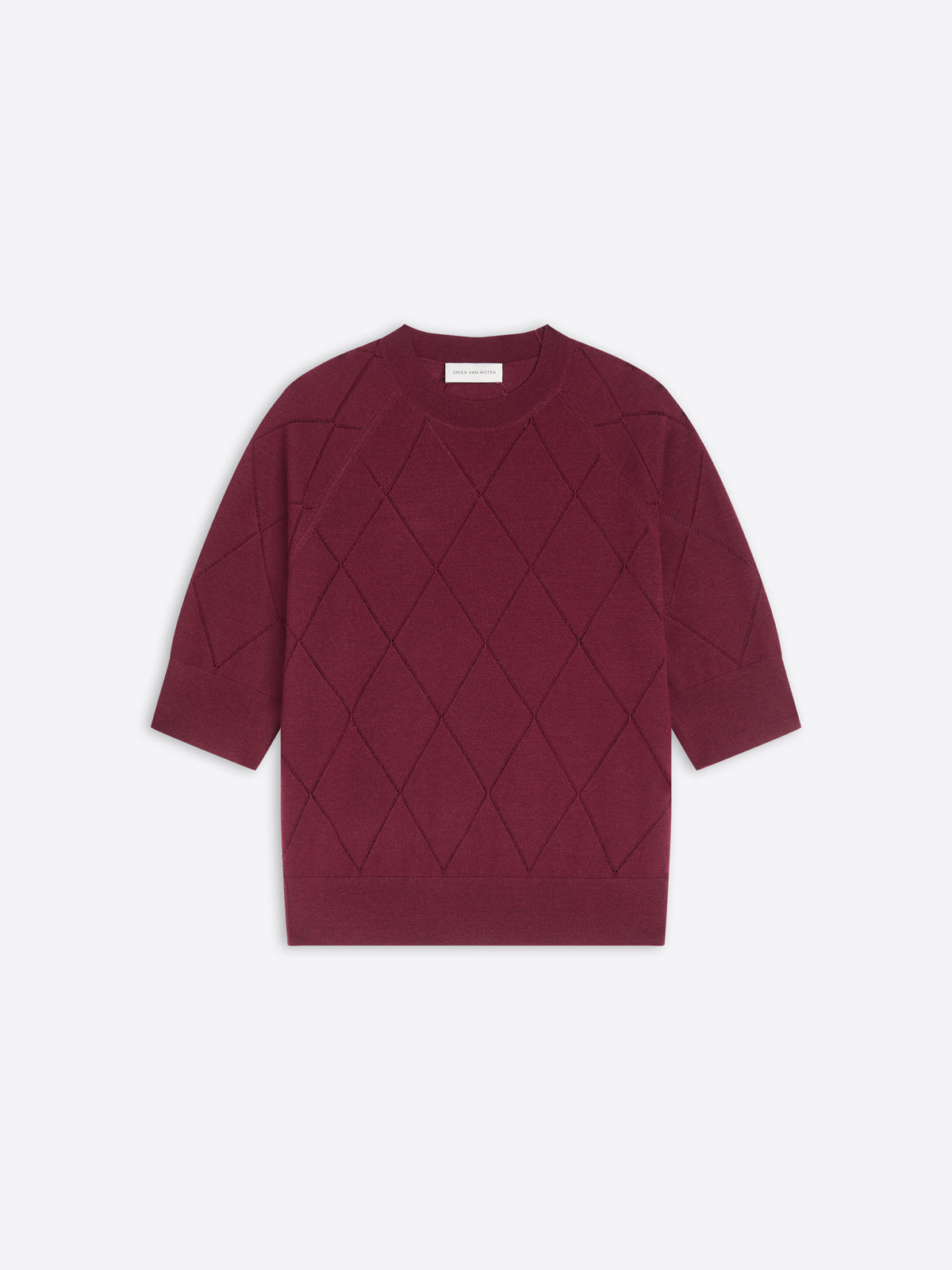 Burgundy knit top with diamond pattern on a white background