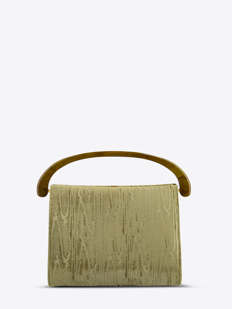 Green textured handbag with a handle on a white background