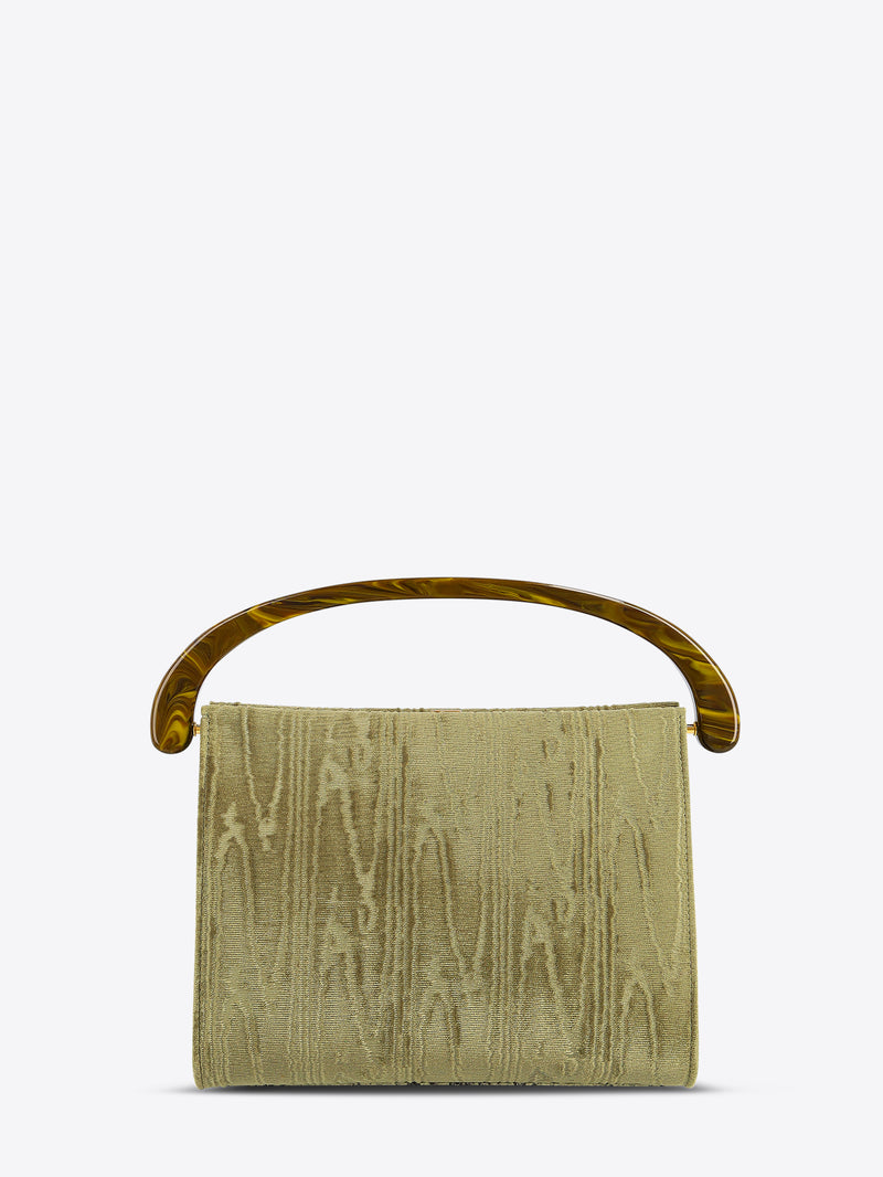 Green textured handbag with a wooden handle on a white background