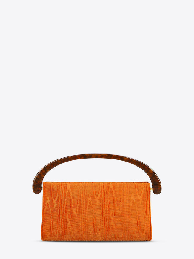Orange handbag with wooden handle on a white background