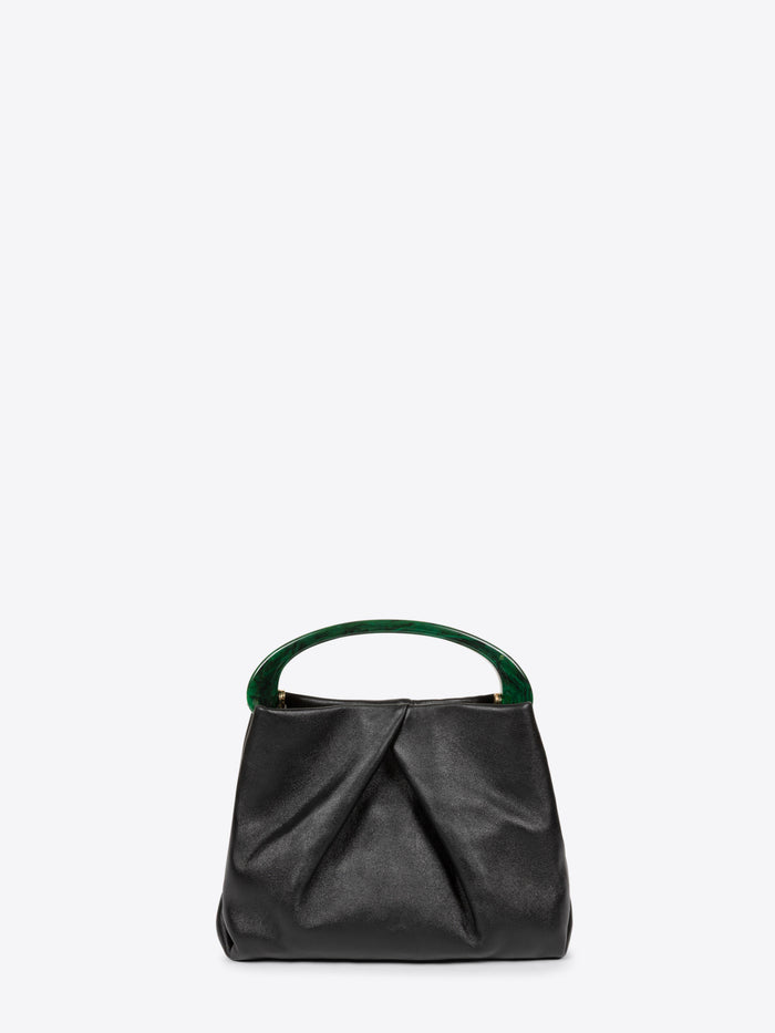 A black leather slouchy handbag with a curved dark green handle, shown against a light gray background.