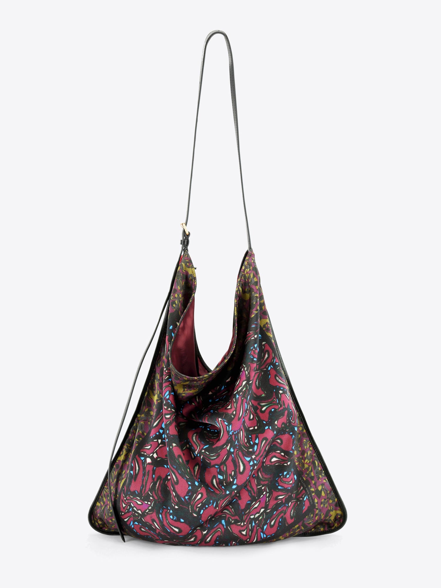A shoulder bag with a dark paisley pattern, featuring a thin black strap, shown against a light gray background.