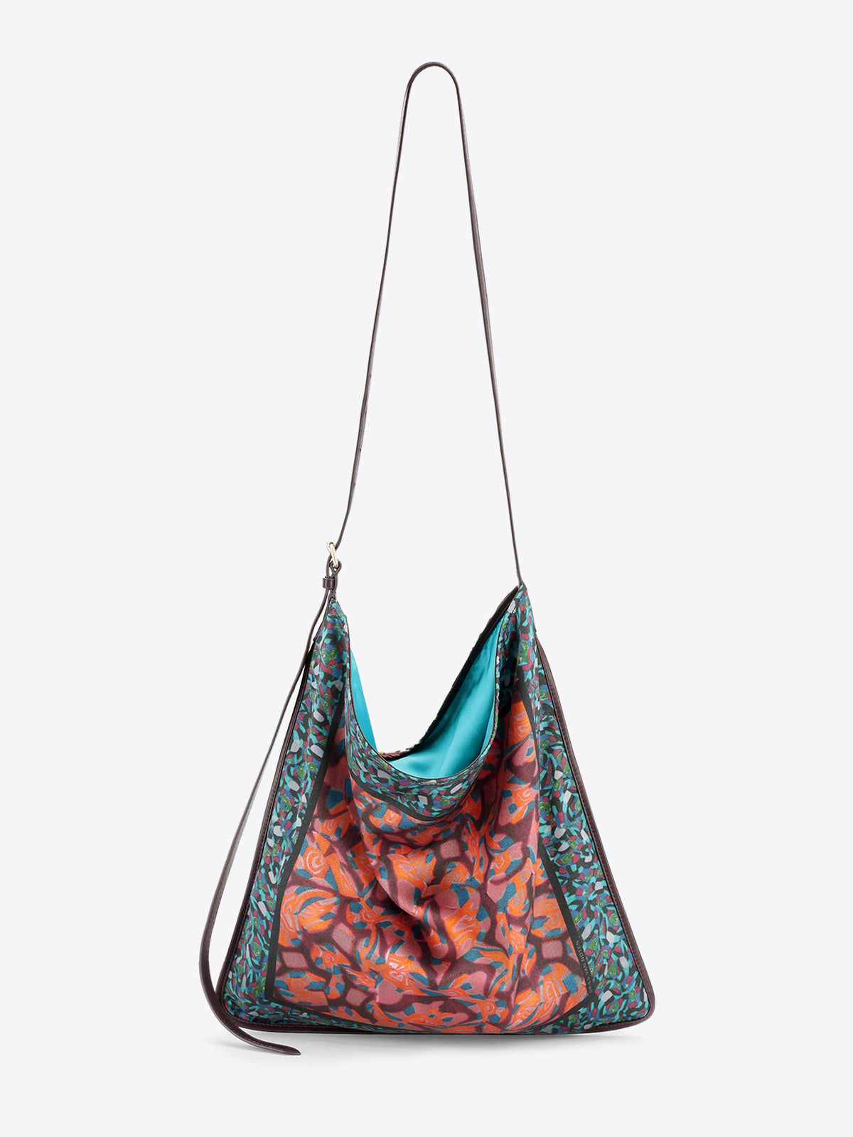 Multicolored bag with a strap on a light grey background