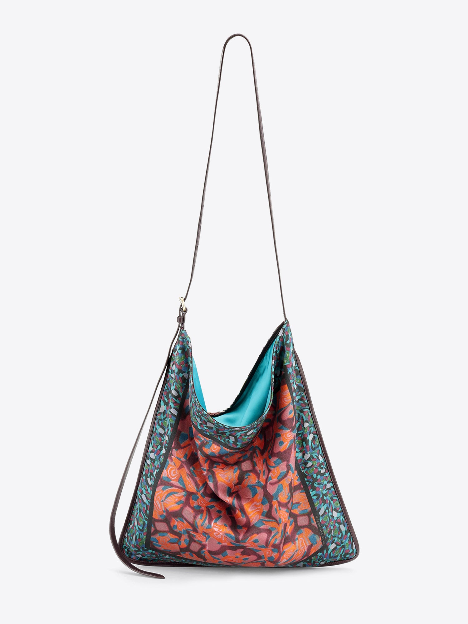 Multicolored bag with a strap on a light grey background