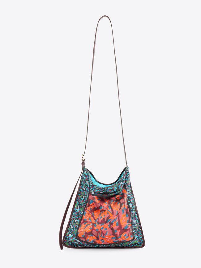 Multicolored patterned handbag with a strap on a white background