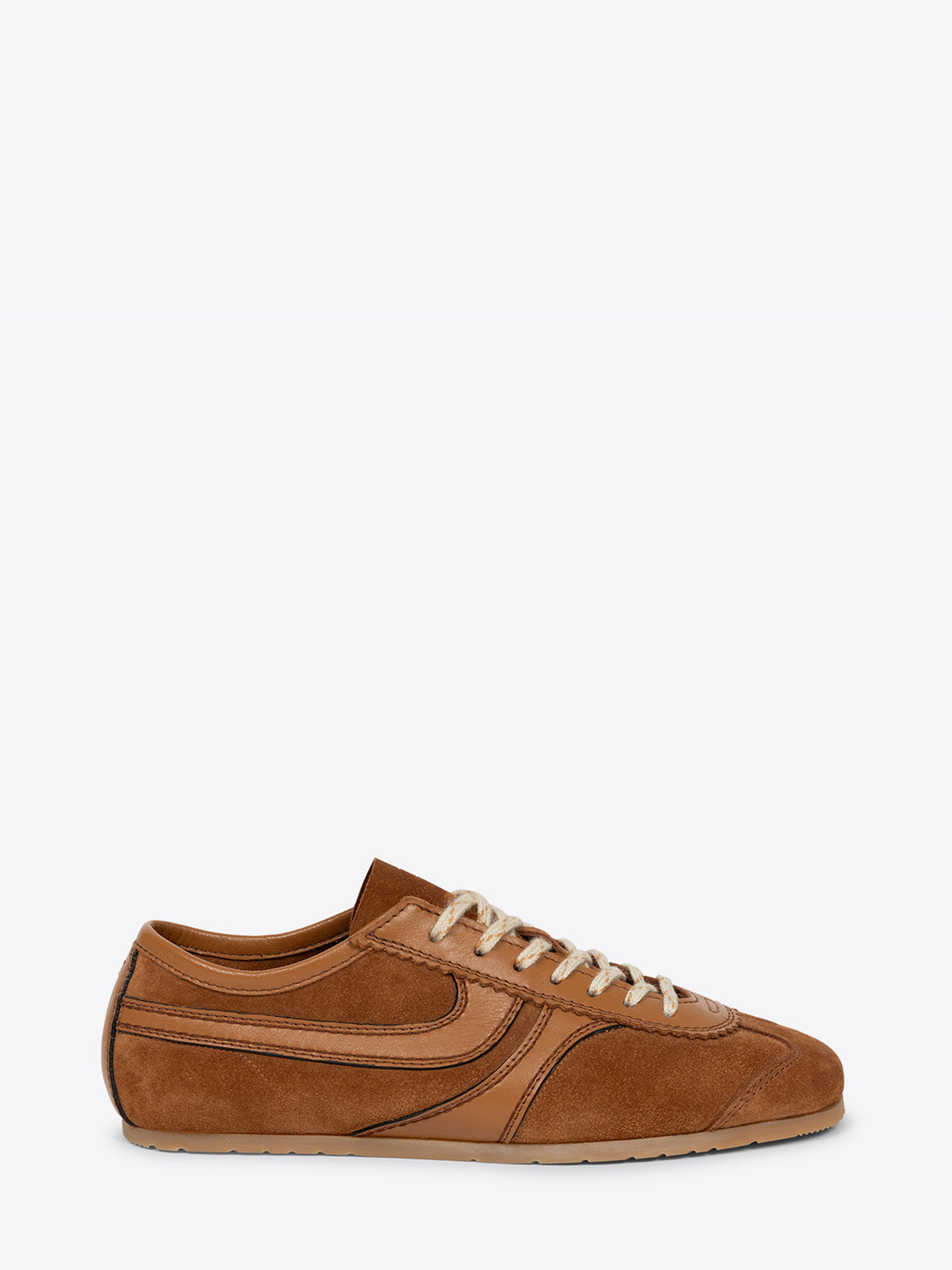 Brown suede sneaker on a white background
