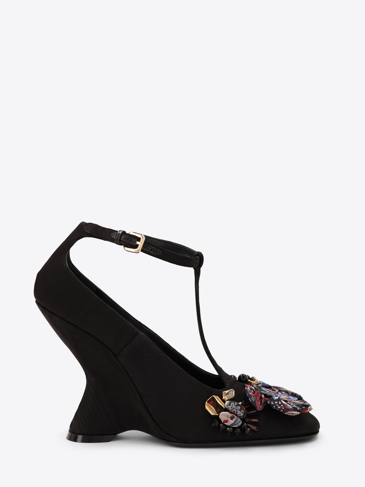Black heel shoe with floral embroidery on a white background
