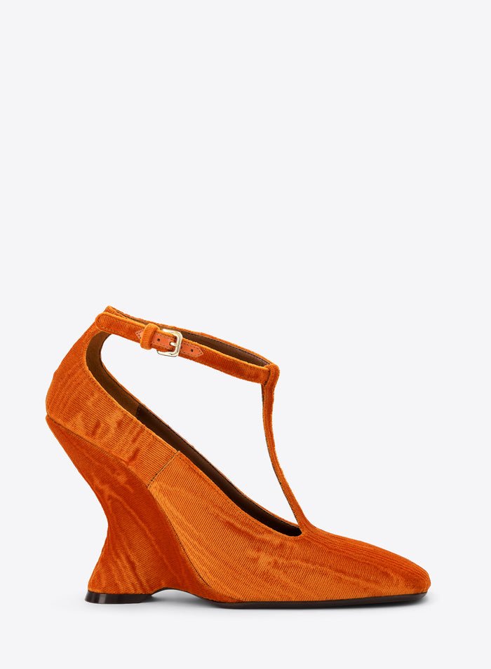 Orange high-heeled shoe with a strap on a white background