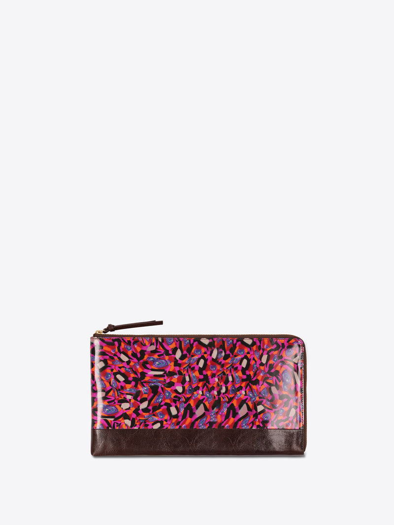 A zip-around wallet with a glossy multicolor abstract pattern on the front and a dark brown leather base, shown against a light gray background.