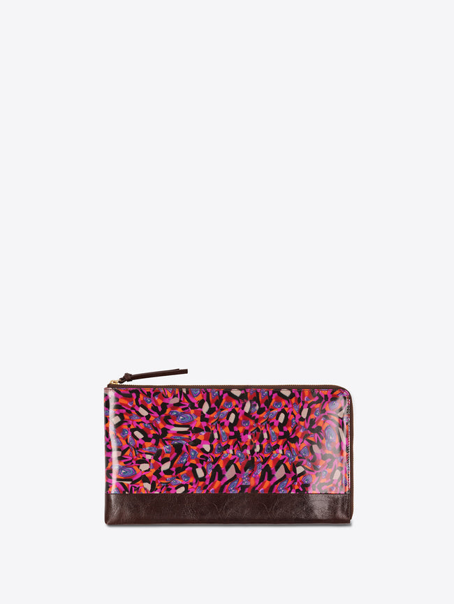 A zip-around wallet with a glossy multicolor abstract pattern on the front and a dark brown leather base, shown against a light gray background.