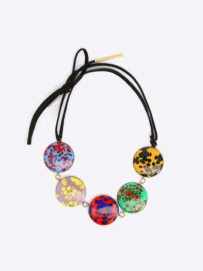 Necklace with colorful round beads on a white background