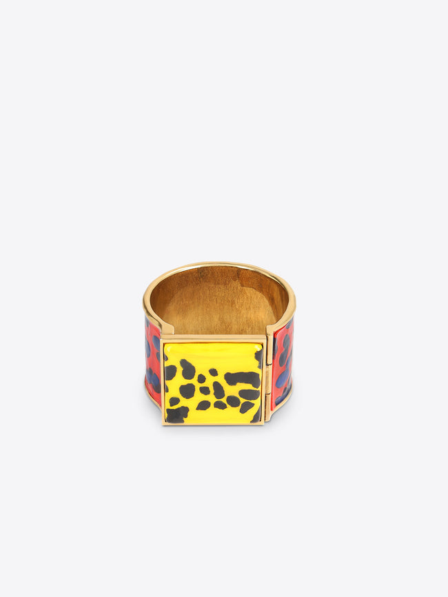 Colorful animal print bracelet on a light grey background