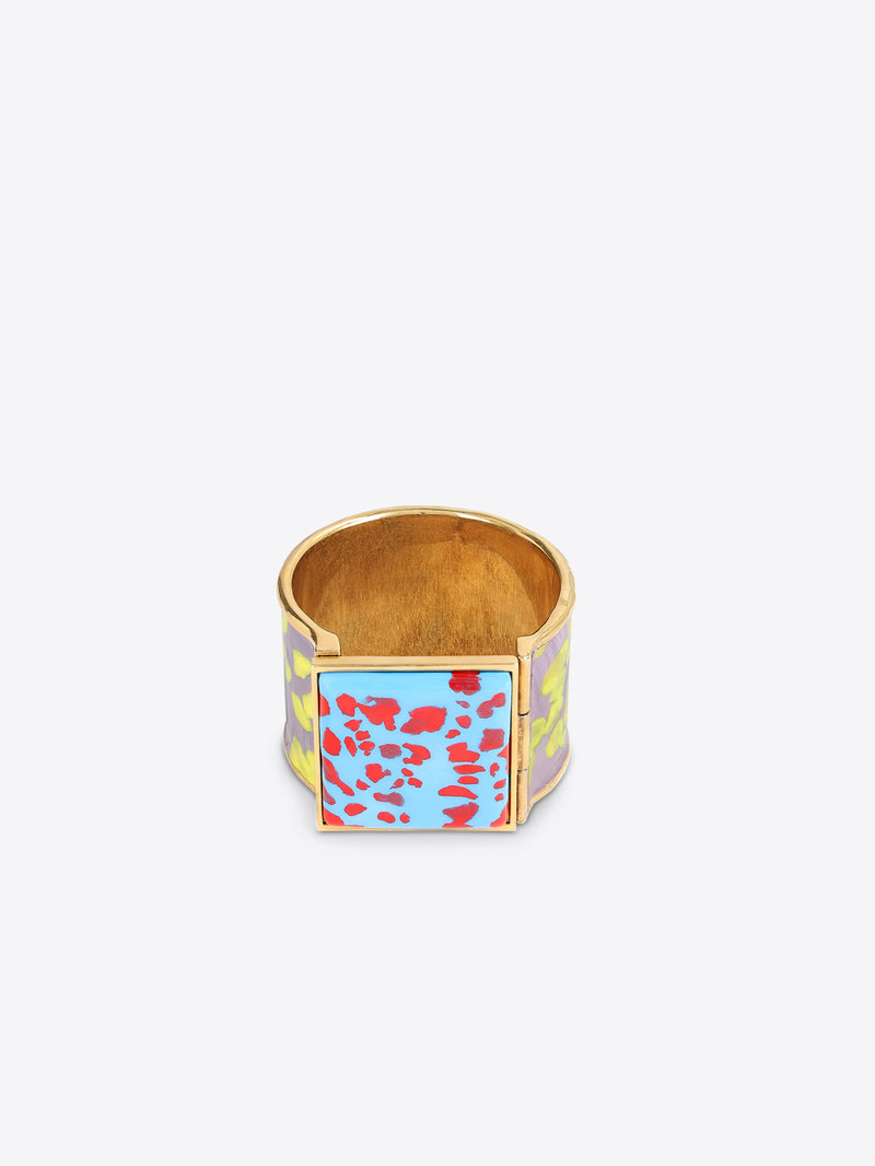 Colorful bracelet with floral pattern on a light grey background