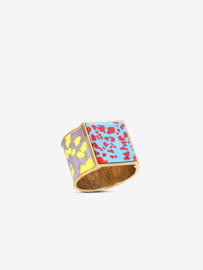 Colorful bracelet with floral pattern on a light grey background