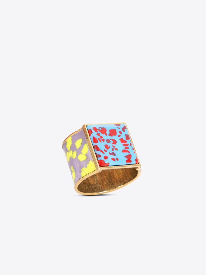 Colorful bracelet with floral pattern on a light grey background