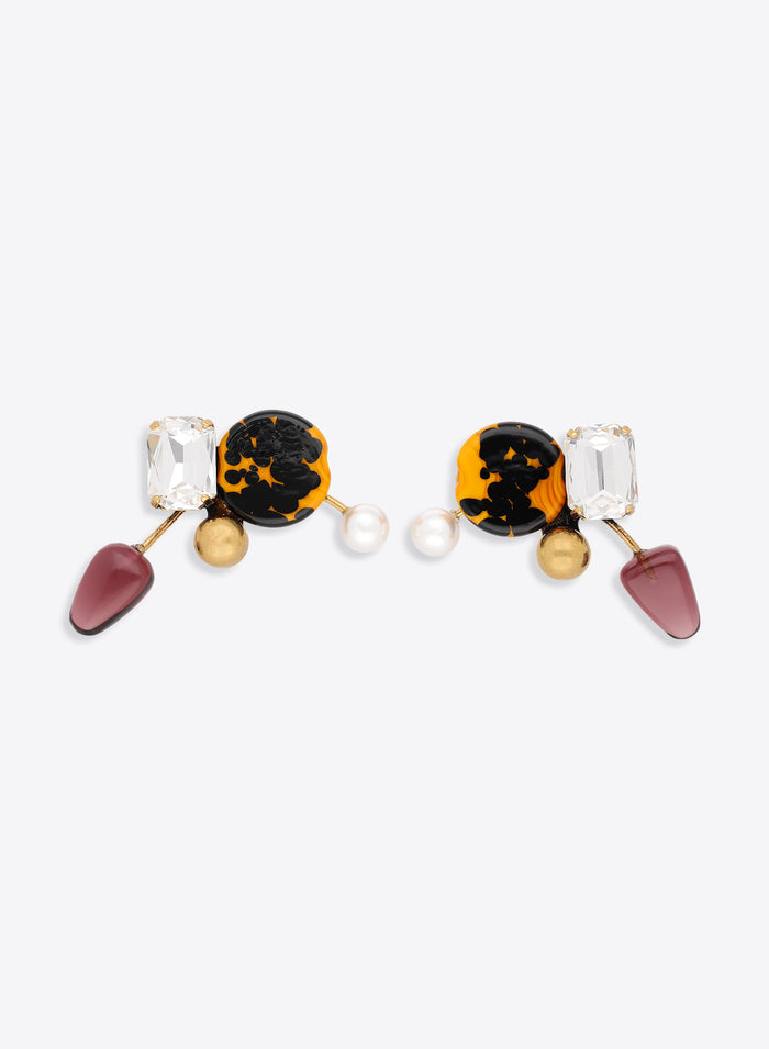 Pair of earrings with colorful gemstones on a white background