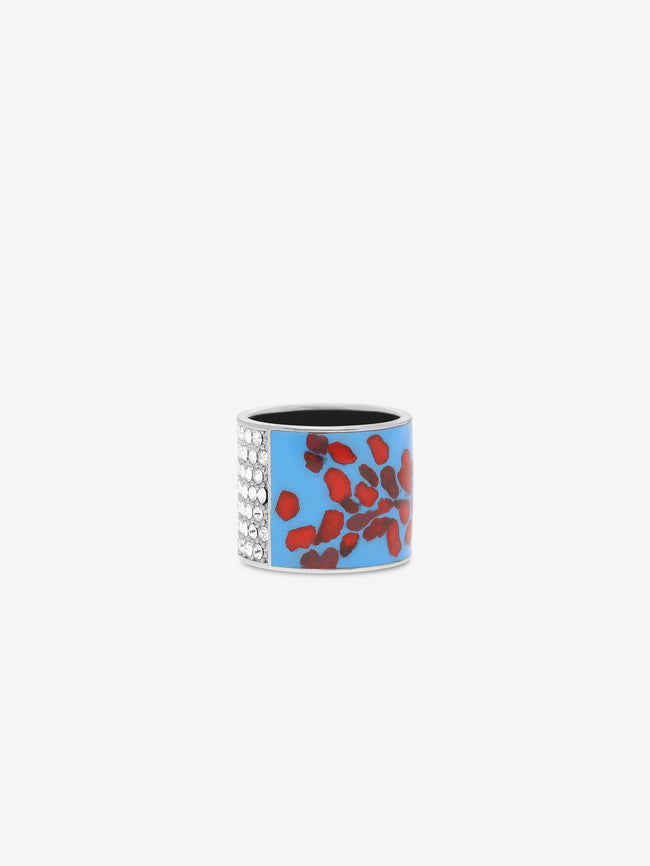 Statement ring with sparkling crystals and a red-blue abstract pattern 