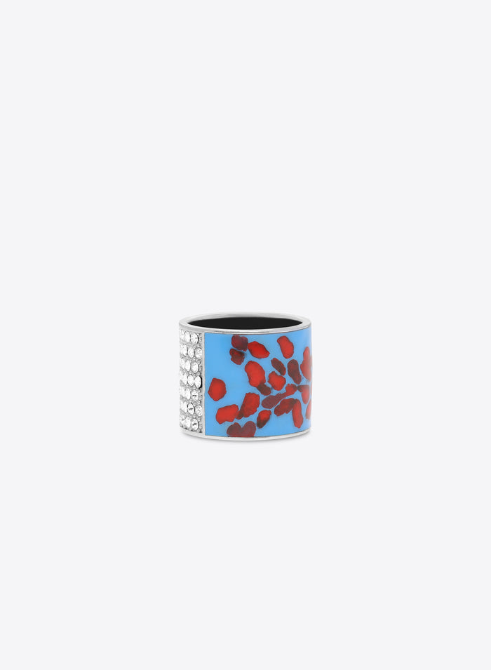 Statement ring with sparkling crystals and a red-blue abstract pattern 