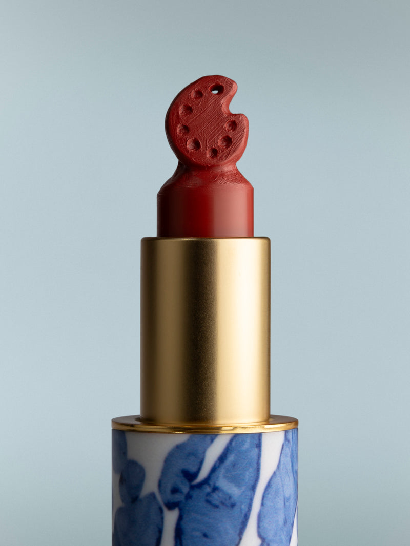 Lipstick with a unique design on a gray background