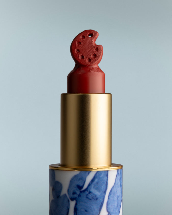 Lipstick with a unique design on a gray background