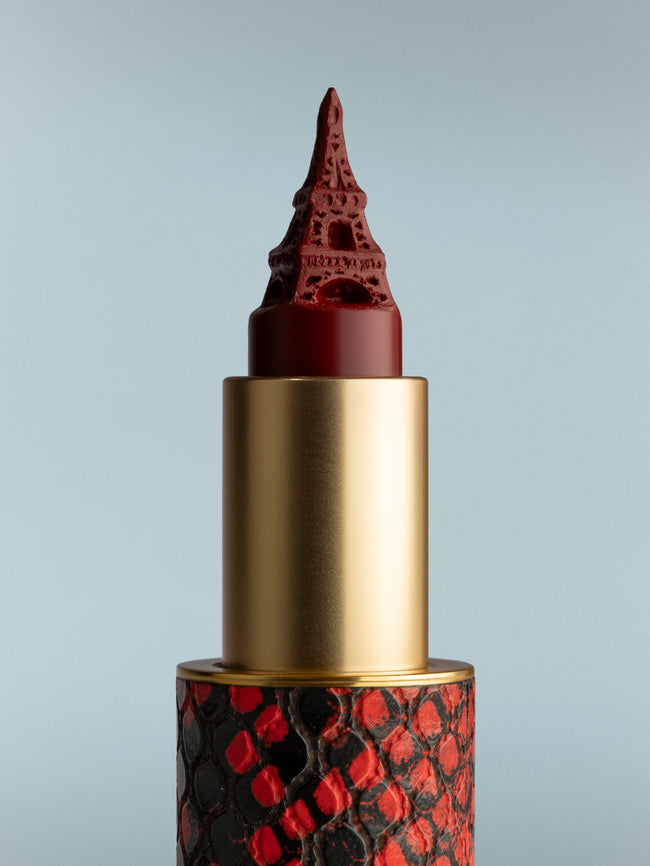 Lipstick with a unique design on a gray background