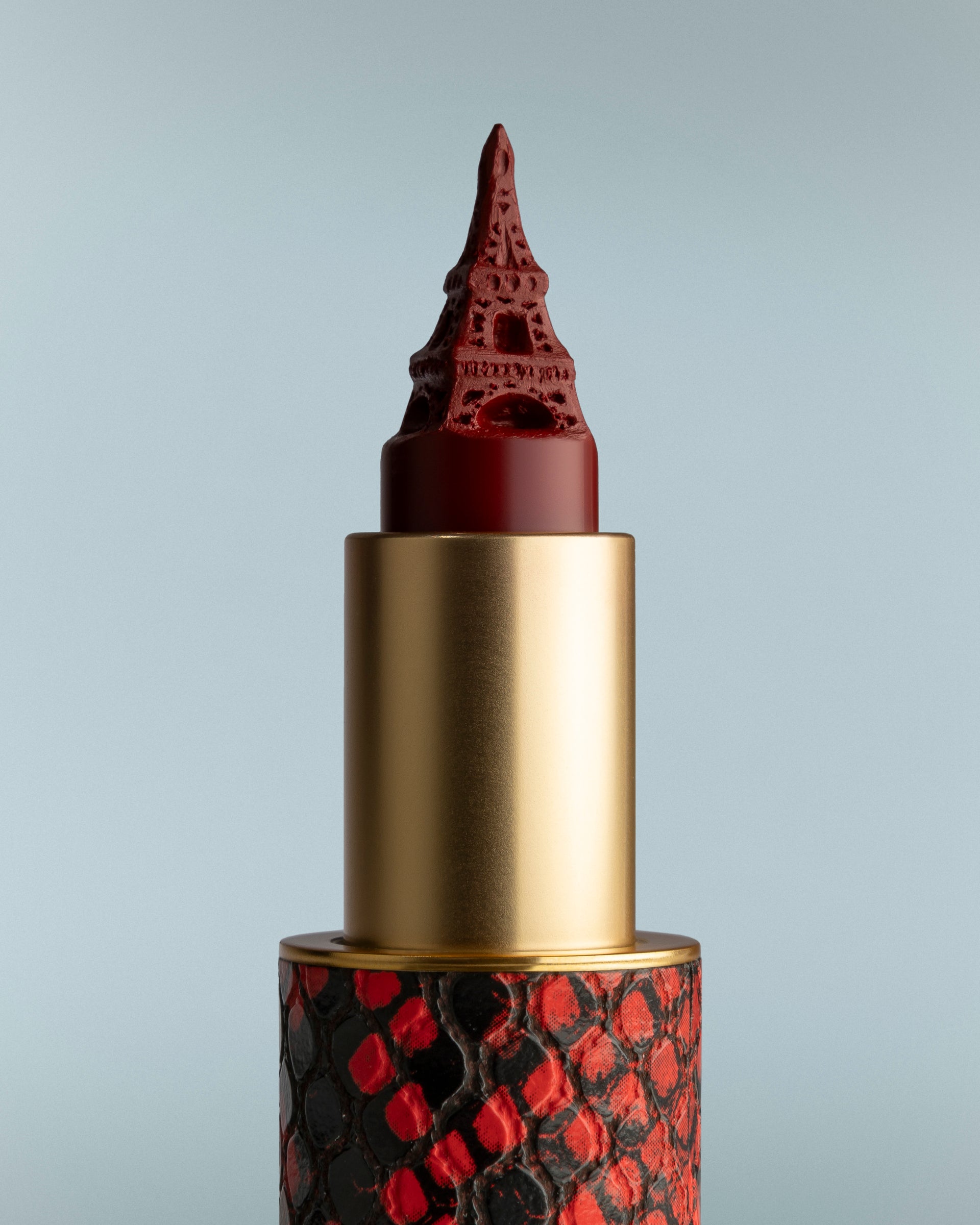 Lipstick with a unique design on a gray background