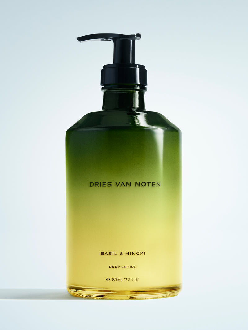 Dries Van Noten body lotion bottle on a light gray background