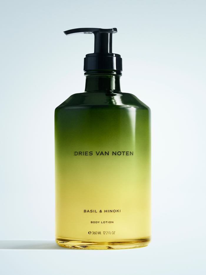 Dries Van Noten body lotion bottle on a light gray background