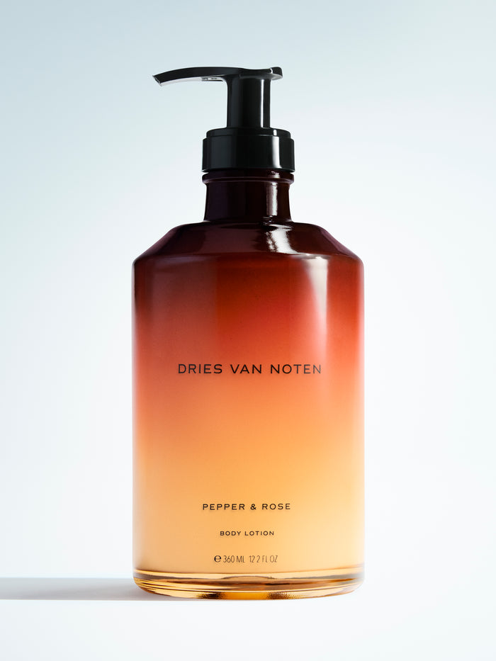 Dries Van Noten body lotion bottle with gradient design on a light background