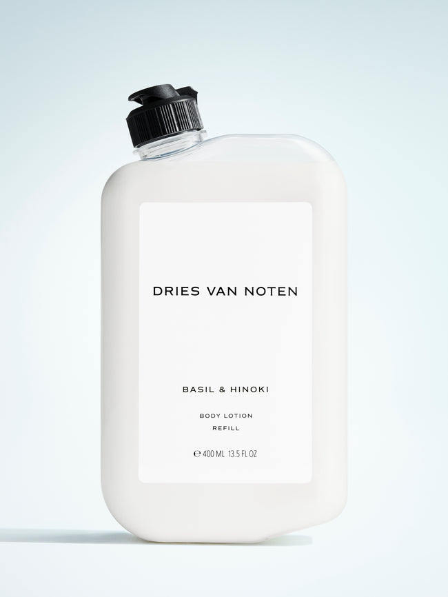Dries Van Noten body lotion refill bottle on a light gray background
