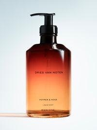 Dries Van Noten liquid soap bottle with pump on a light gray background