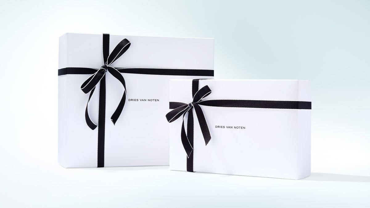 Two branded Dries Van Noten gift boxes on a white backround.