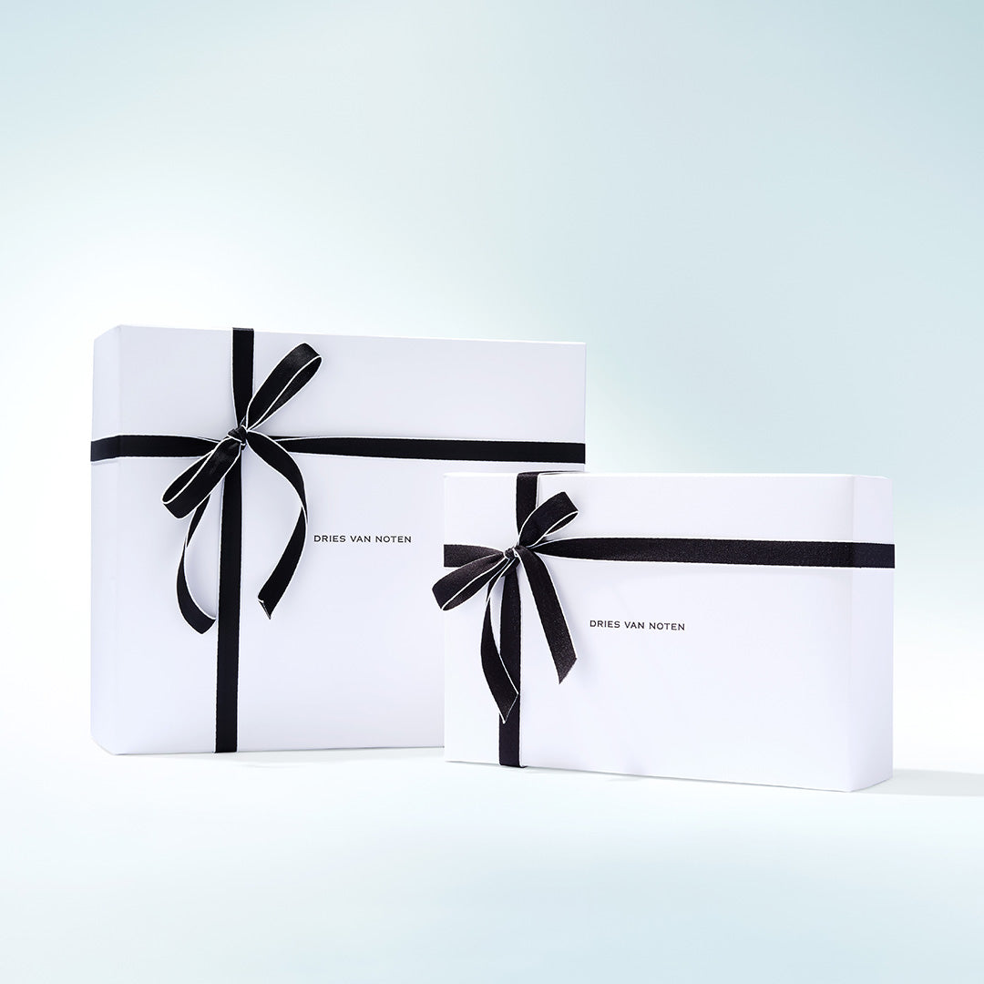 Two branded Dries Van Noten gift boxes on a white backround.