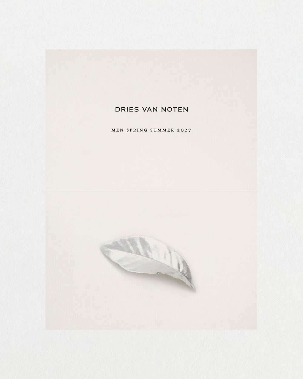 Post card with Dries Van Noten men's spring summer 2027 collection with a silver leaf