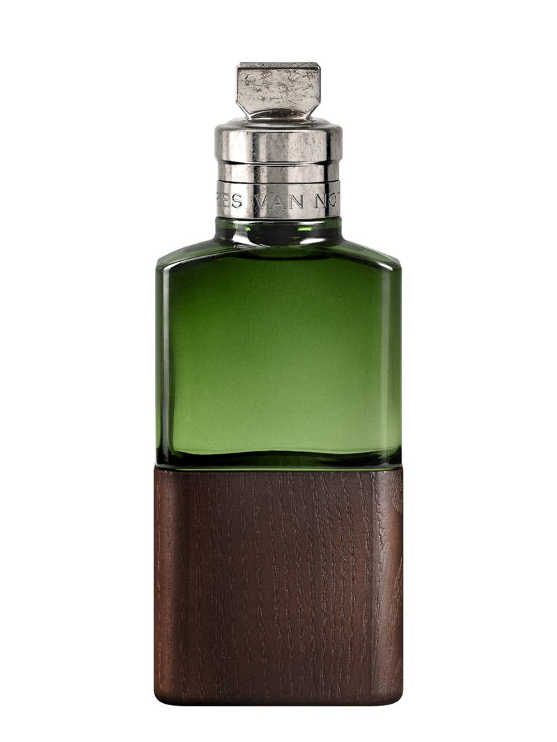 Green perfume bottle with wooden base on a white background