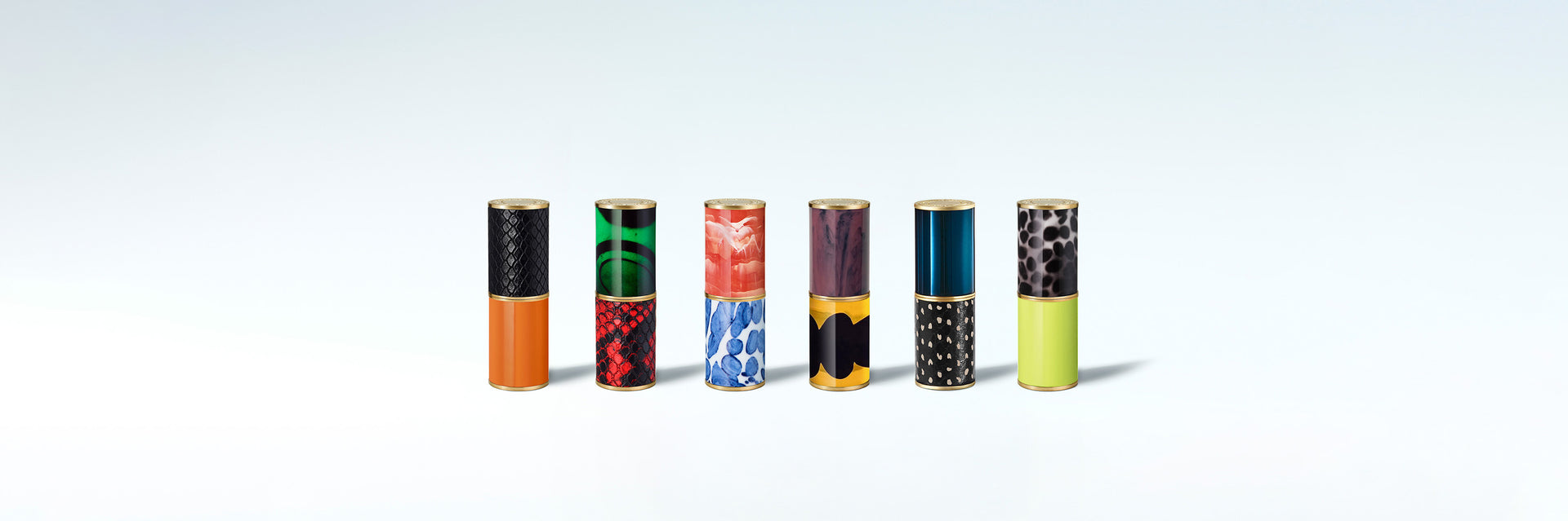 Six colorful patterned cases displayed in a row on a light blue background 