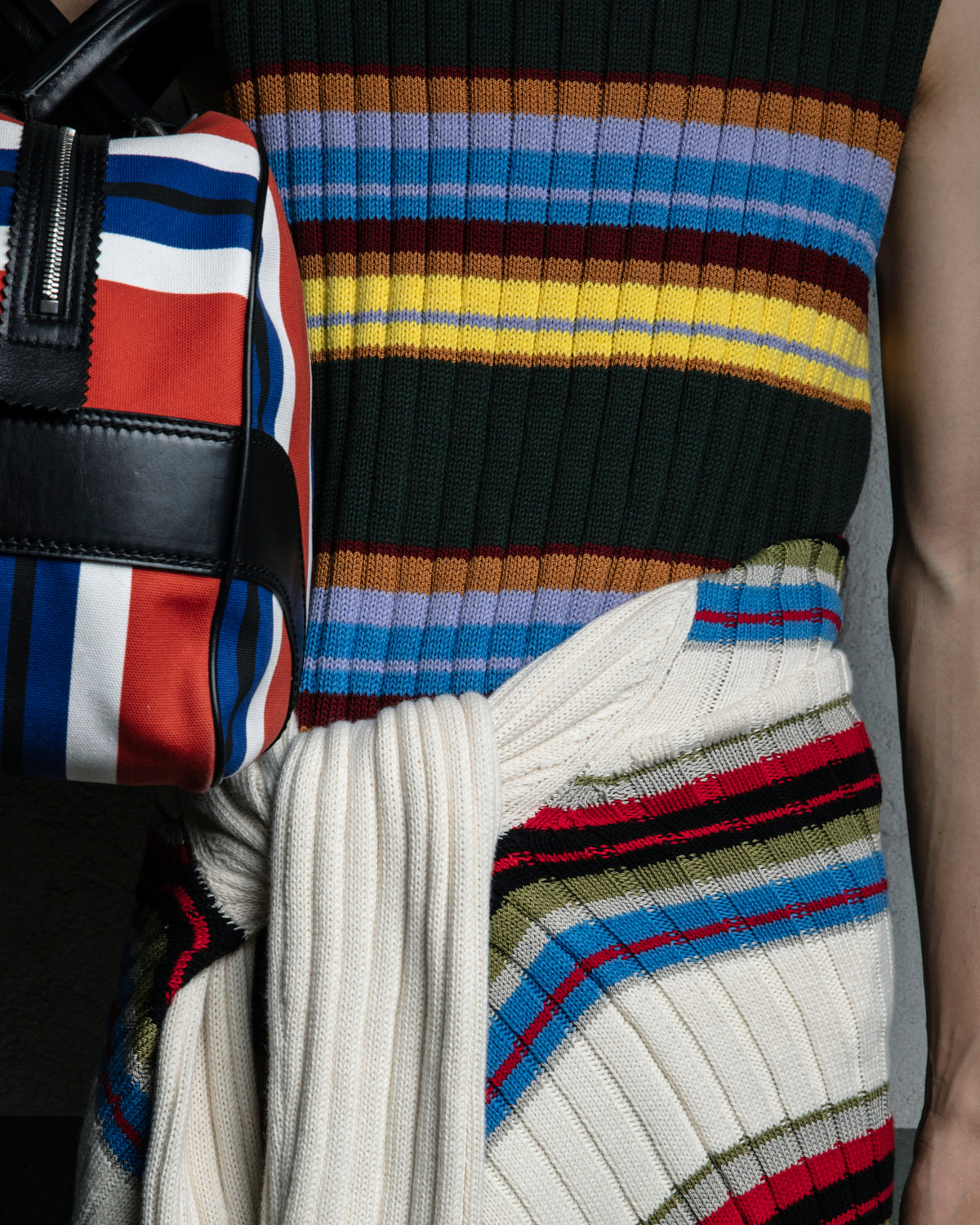 Close-up of a multicolored striped sweater with a focus on the pattern and texture - Dries Van Noten