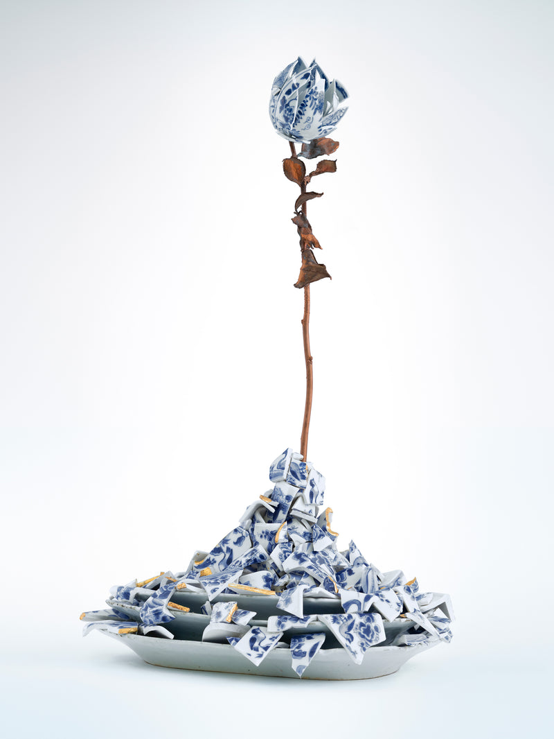 Decorative piece with blue and white ceramic elements on a white background - Dries Van Noten