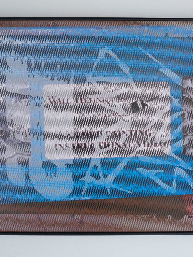 Framed artwork with a blue and white abstract design on a white background