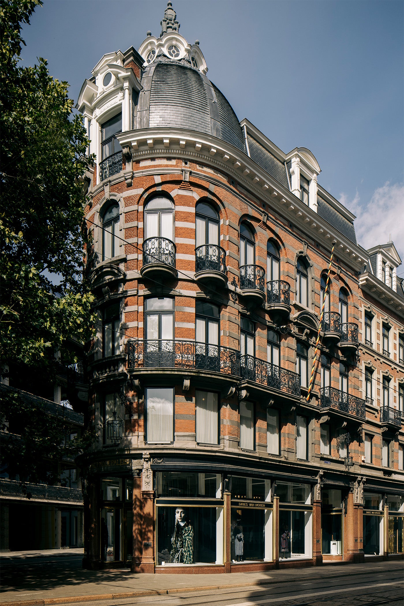 Corner building with architectural details in an urban setting