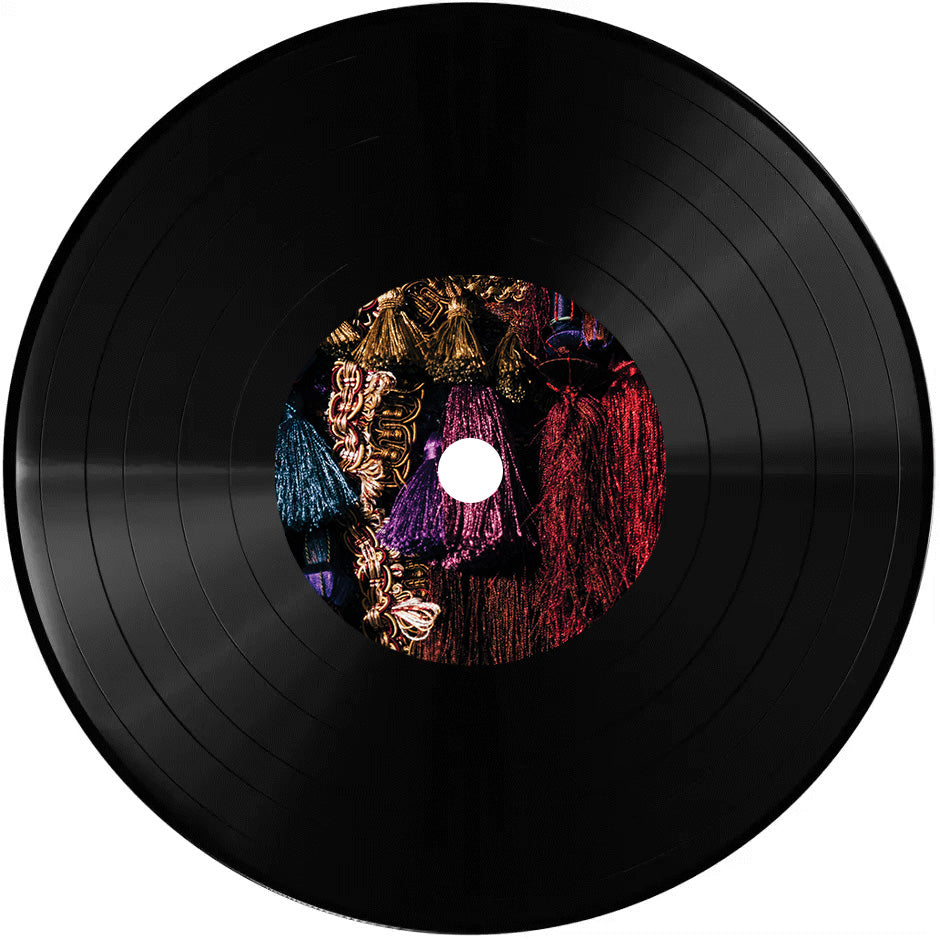 Black vinyl record with a colorful label on a white background